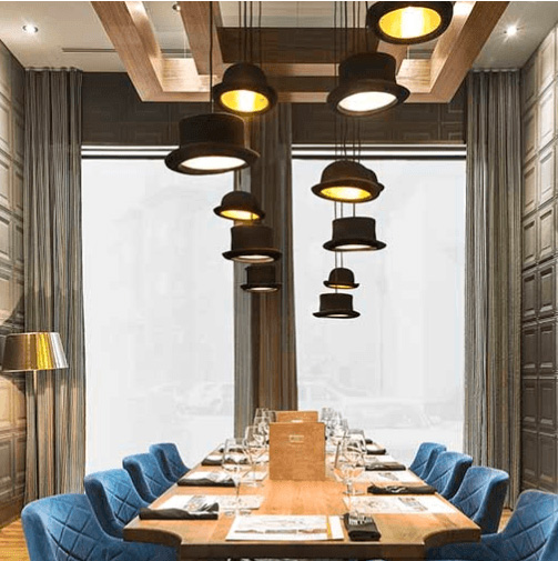 Innermost JEEVES black felt bowler hat ceiling pendant with anodised gold interior