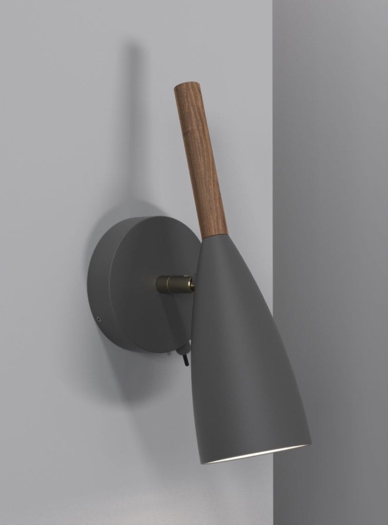 Grey switched plug in wall light.