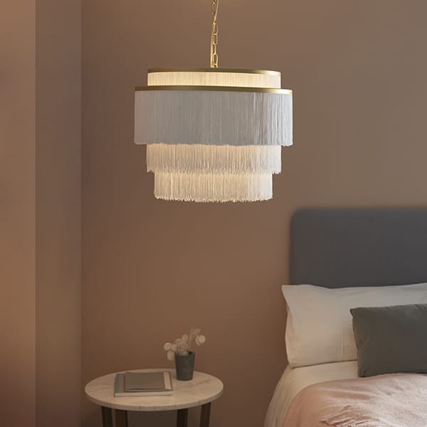 glamorous chandelier with soft fringe shade