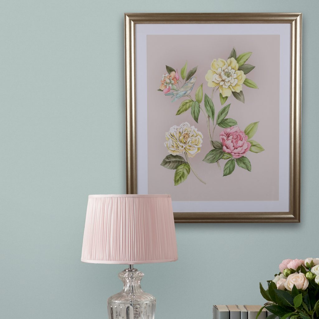 Flower wall art on a turquoise wall by Laura Ashley for the bedroom 