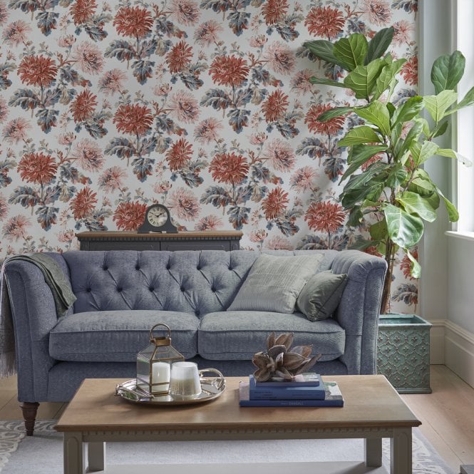 Large plant pot and sofa in a living room setting
