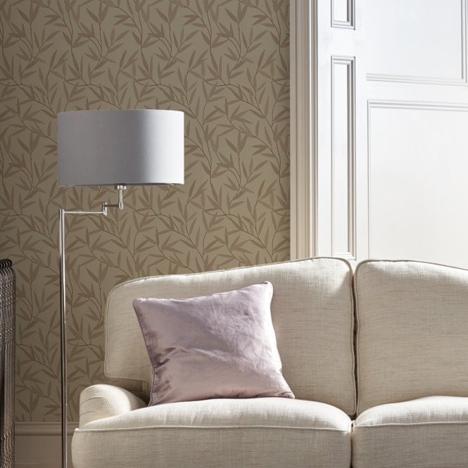 Swing arm floor lamp next to a sofa.