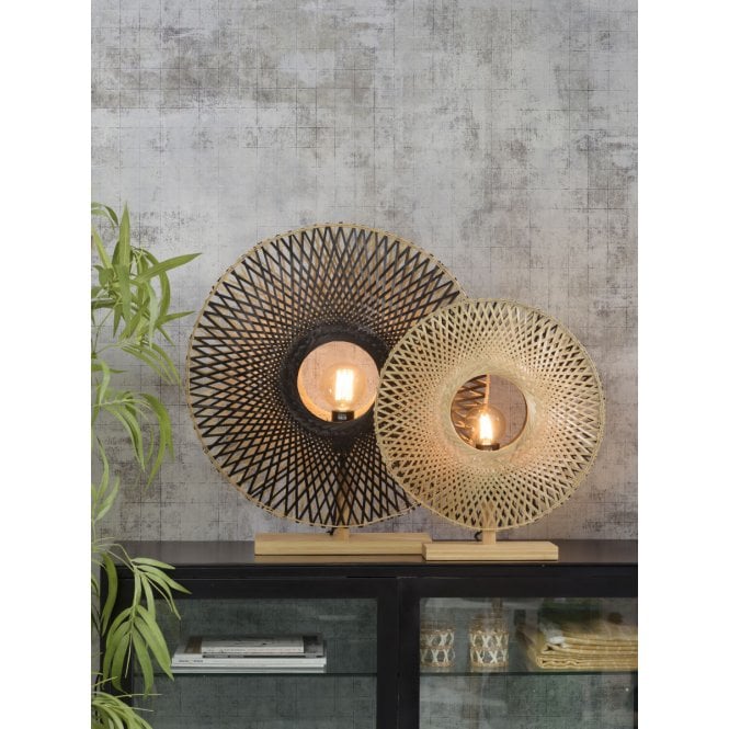 Two Rattan table lamps on a side cabinet next to a pot plant.