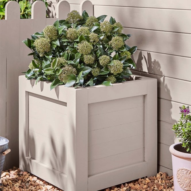 Outside pink painted planter 