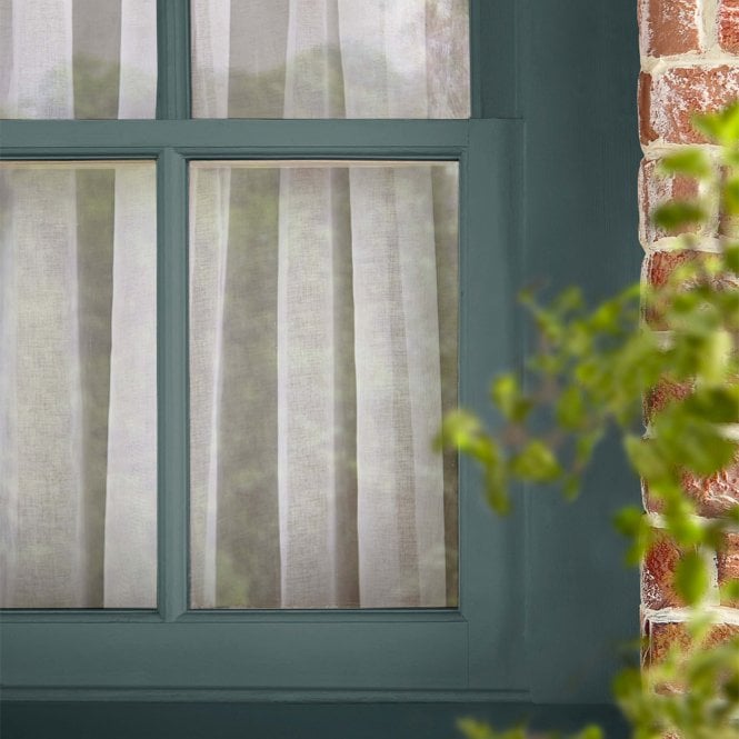 Dark green painted exterior window 