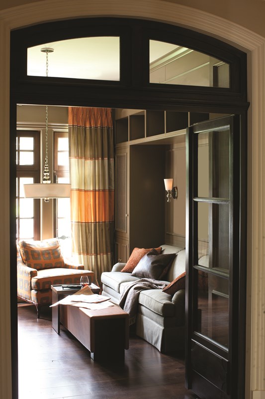 front room showing interiors such as curtains, wall lights and pendant lights
