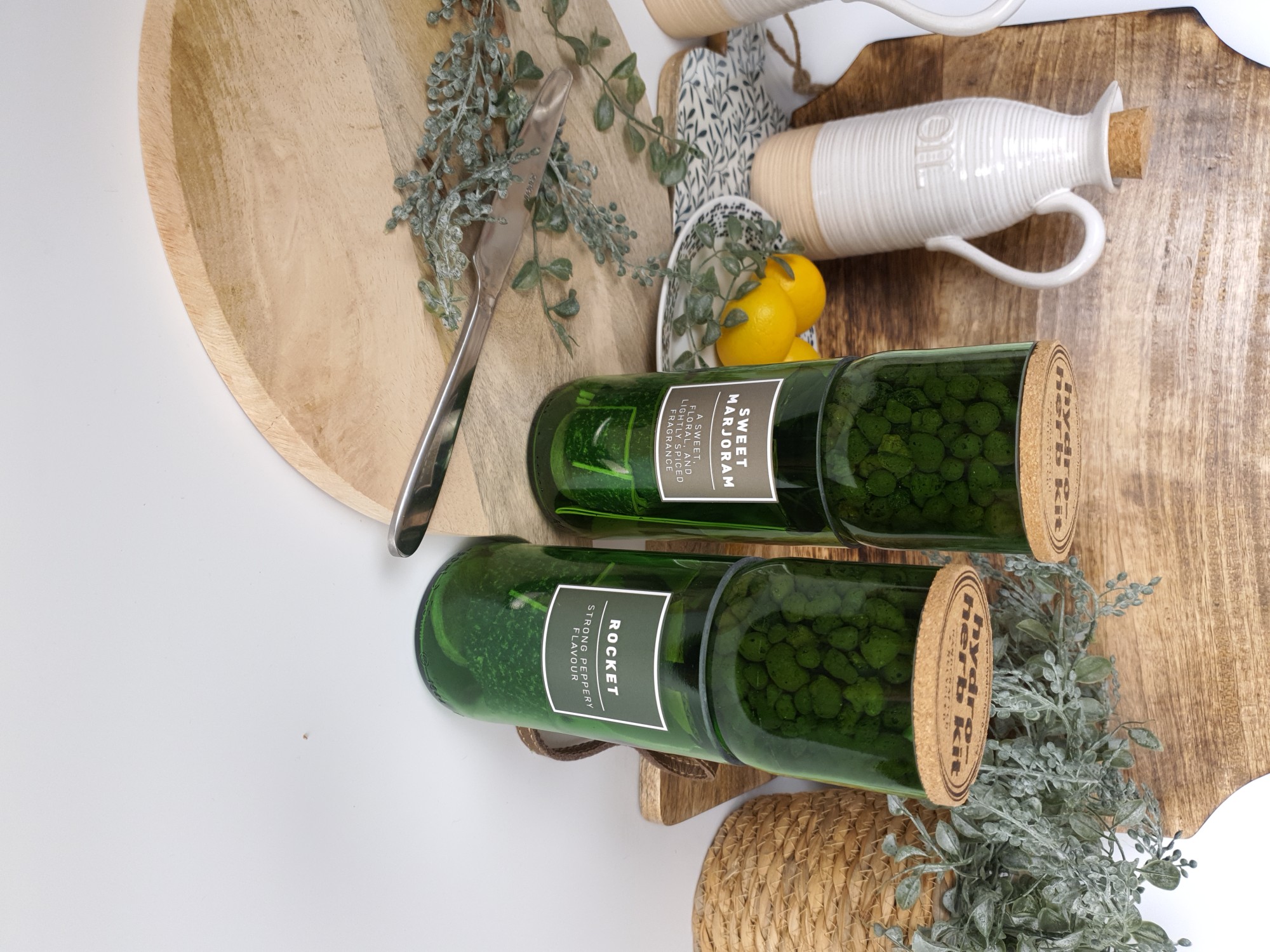 hydro herb kits in front of kitchen utensils