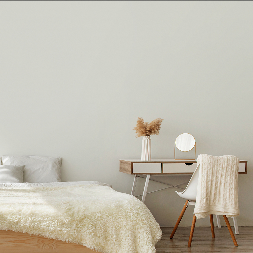 white coloured small bedroom