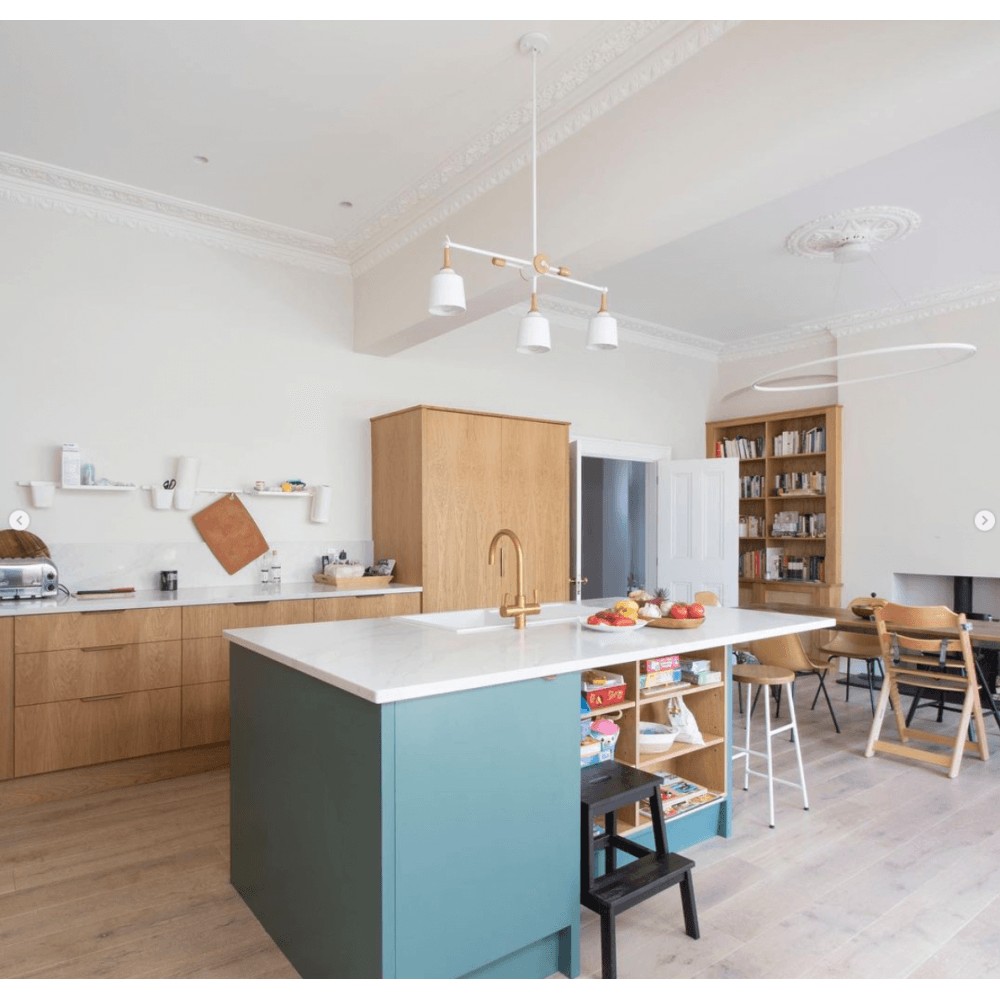 Scandinavian inspired design kitchen with bar pendant light.