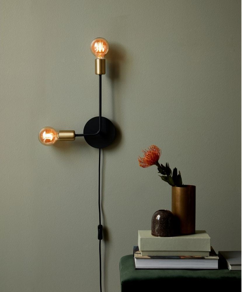 Plug in wall light with switch