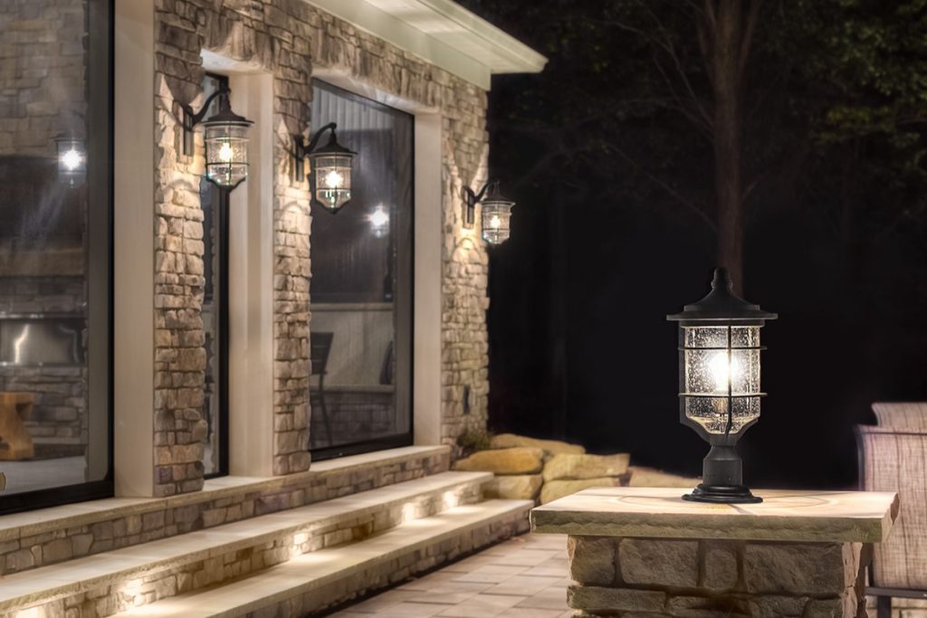 nautical style outdoor wall lantern and pedestal light in black