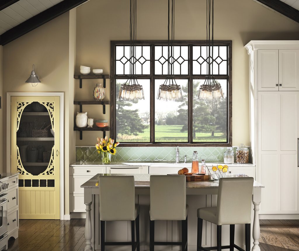 ceiling pendant cluster hanging from a vaulted ceiling over a kitchen table