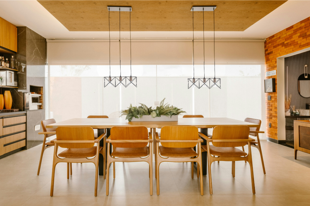 oak, white and black home interior. with large hanging lights over oak table, 3 light.