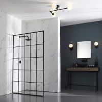 Black bathroom lights create a contrast with white bathrooms.