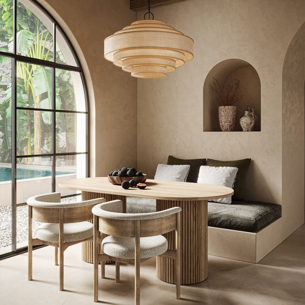 large natural pendant light shown above a table a relaxed beach house, coastal inspired interior