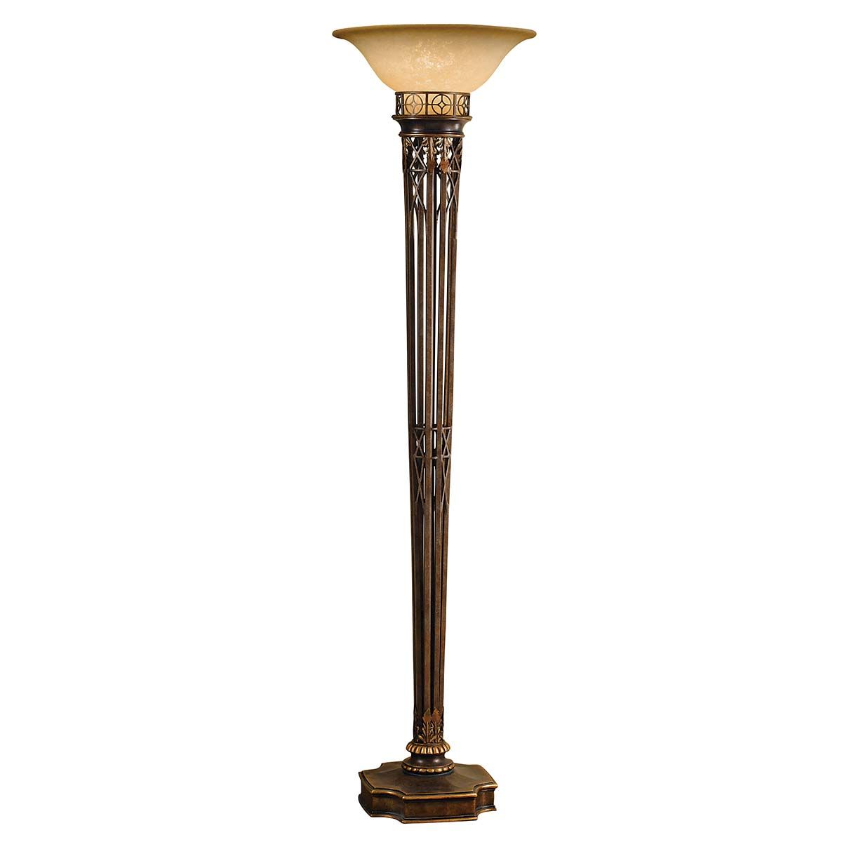 A gothic wall torchiere with ornate metalwork and amber glass shade