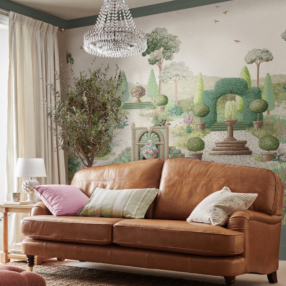 A chandelier hanging above a sofa