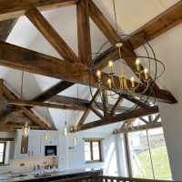 Vaulted beamed ceiling light by Feature Light Orb and spotlights