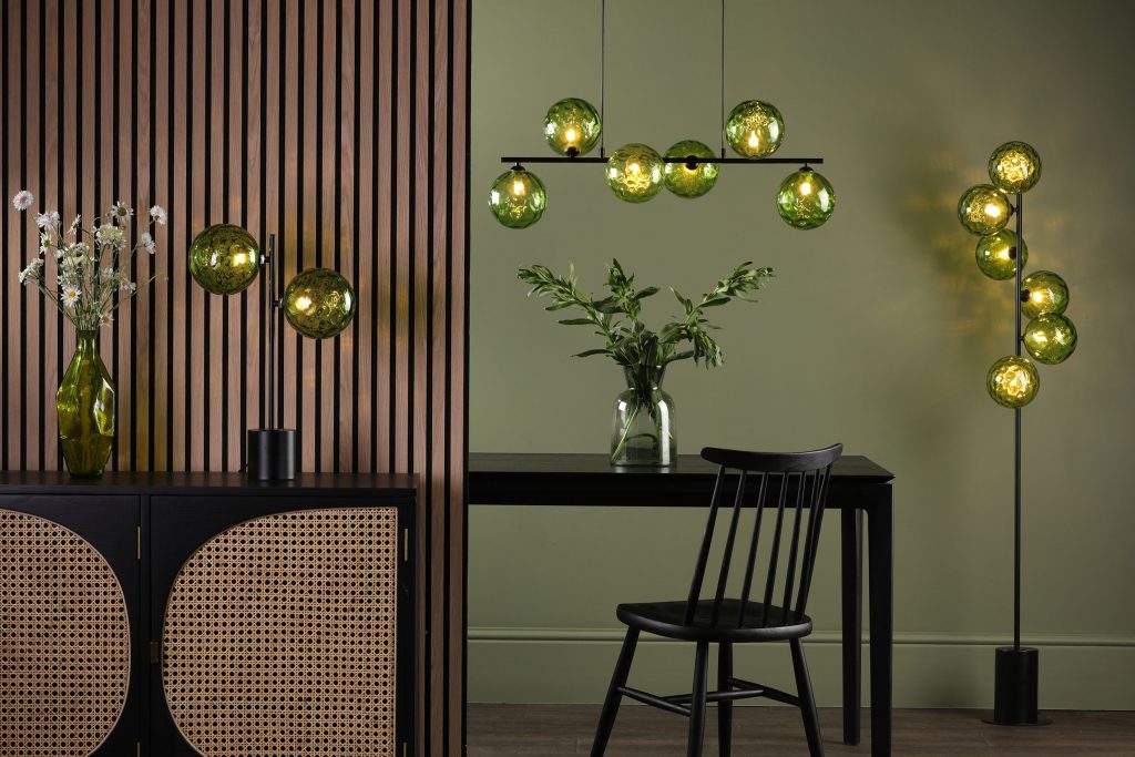 Light fittings with green glass shades.Brighten up a modern room.