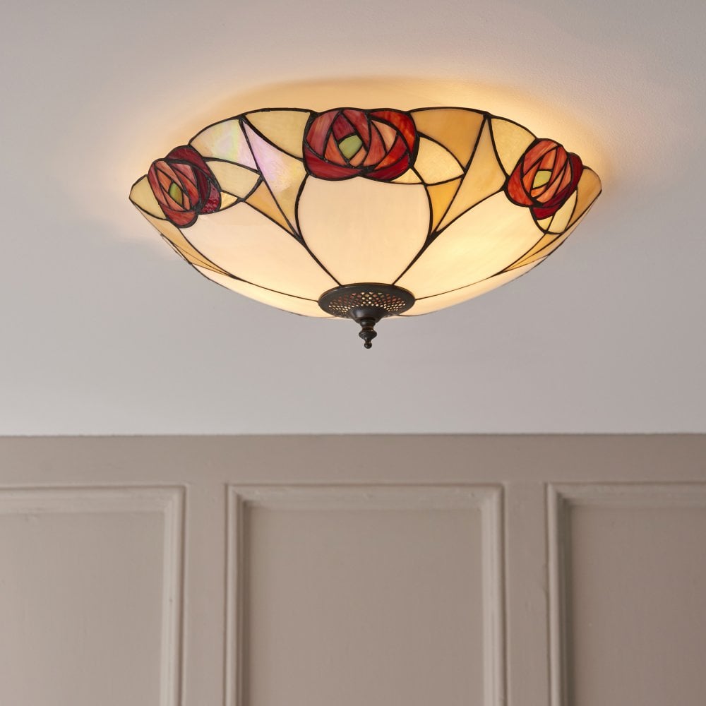 a tiffany style uplighter ceiling light fitting with decorative colours glass panels