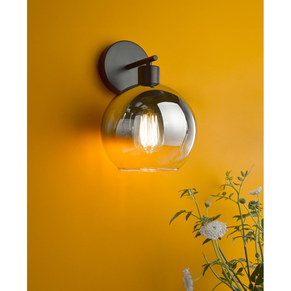 a modern black and smoked ombre glass wall light