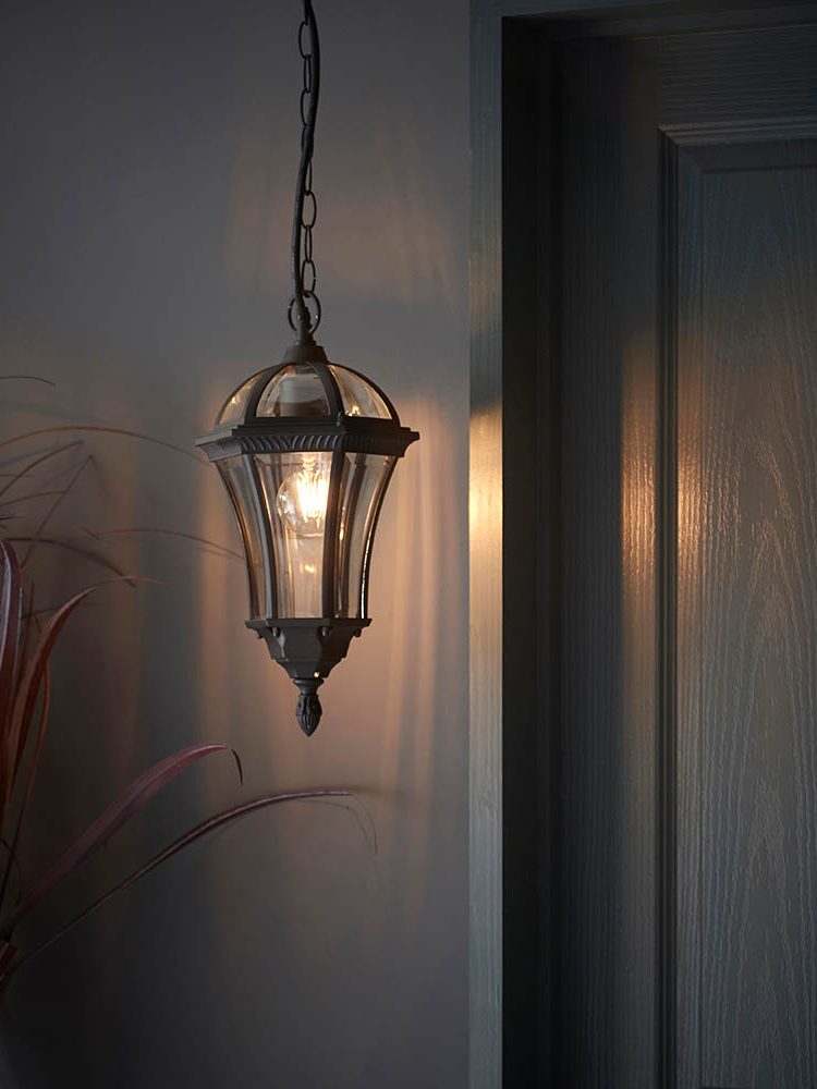 a black and glass hanging lantern
