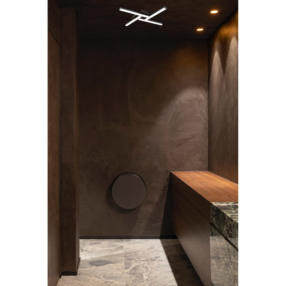 modern LED bathroom ceiling light in a dark bathroom