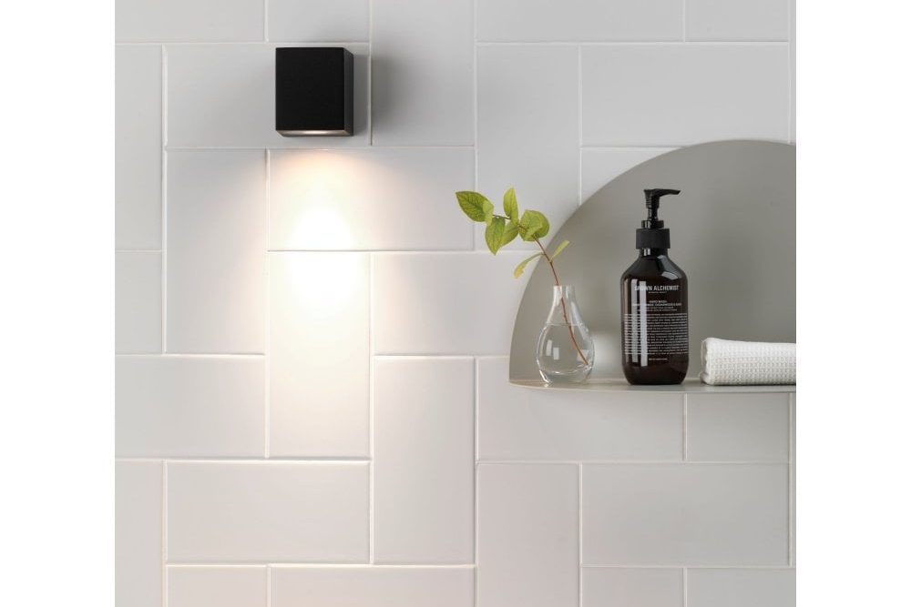 a matt black bathroom wall downlight
