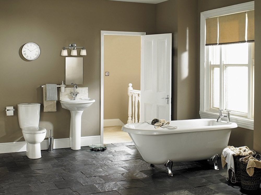 a heritage style bathroom with brushed nickel and opal glass mirror lights