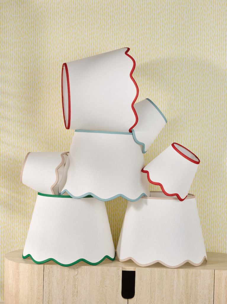 whimsical stack of lampshades in different sizes with colourful trims and scallop edge detail