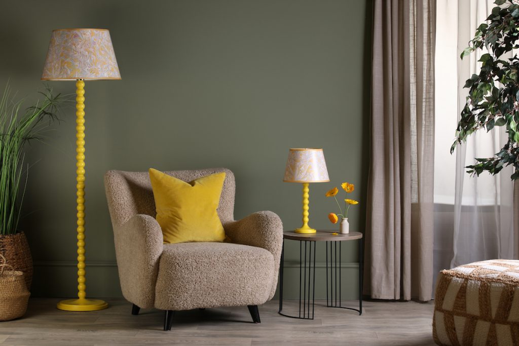 bright yellow floor lamp and table lamp