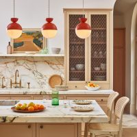 Orange Pendant Light above kitchen Island