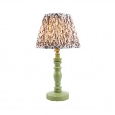 green table lamp with grey leaf pattern shade