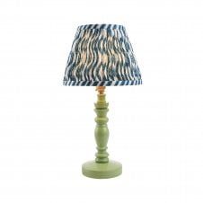 green wooden table lamp with blue ripple pattern shade