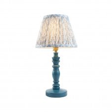 blue table lamp with pale blue leaf pattern shade