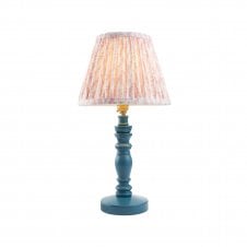 blue wooden table lamp with peach leaf pattern shade