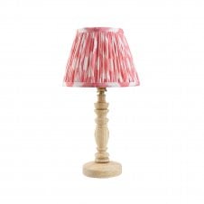 wooden table lamp with pink ikat pattern shade