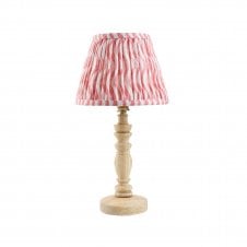 wooden table lamp with pink ripple pattern shade