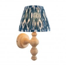 wooden wall light with blue ikat pattern shade