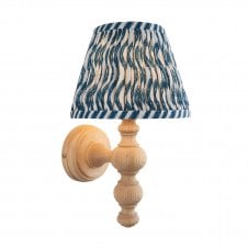 wooden wall light with blue ripple pattern shade
