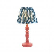 pink wooden table lamp with blue ikat pattern shade
