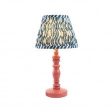 pink wooden table lamp with blue ripple pattern shade