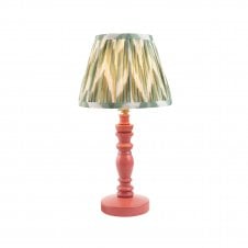 pink wooden table lamp with green zigzag pattern shade