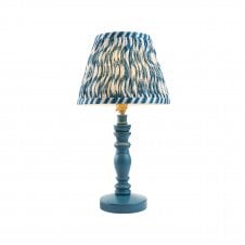 blue wooden table lamp with blue ripple pattern shade