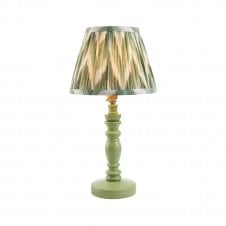 green table lamp with green zigzag pattern shade
