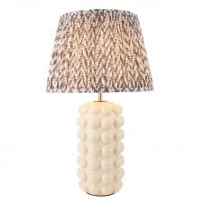 white ceramic table lamp with grey leaf pattern shade