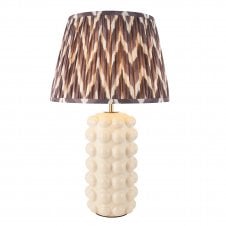 white ceramic table lamp with grey zigzag pattern shade