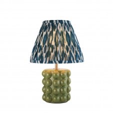 olive green ceramic table lamp with blue ikat pattern shade