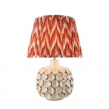 white ceramic table lamp with orange zigzag pattern lampshade