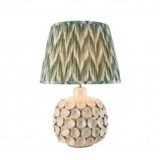 white ceramic table lamp with green zigzag pattern lampshade